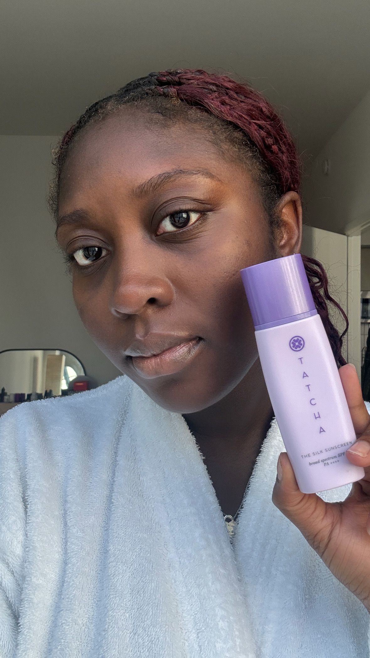 Tatcha Silk Sunscreen on dark skin