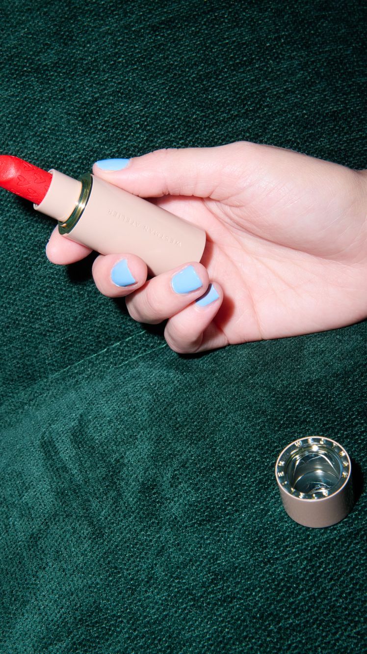 Image may contain Cosmetics Lipstick Baby and Person