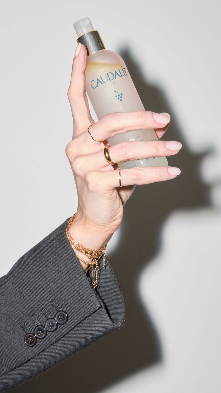 Image may contain Bottle Cosmetics Perfume Body Part Finger Hand Person and Lotion