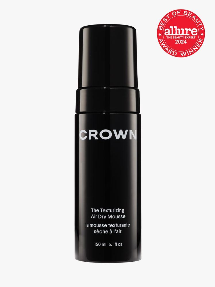 mousse in branded black bottle with cap on light gray background with red and white 2024 allure best of beauty seal