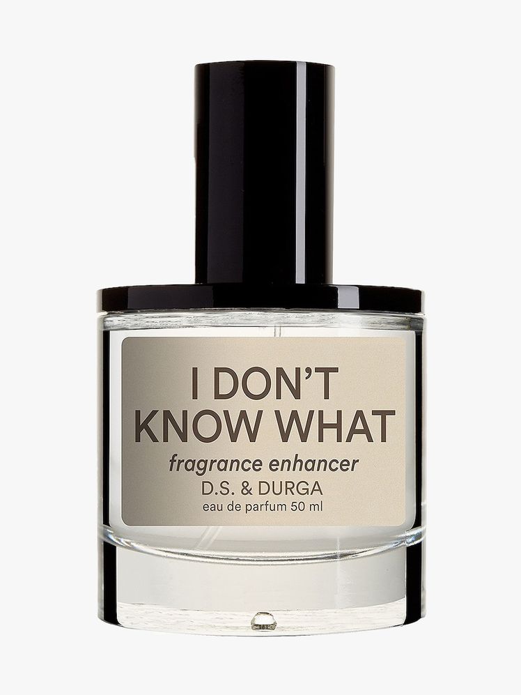 D.S.  Durga I Don't Know What Eau de Parfum bottle of perfume with beige label and skinny black cap on light gray background