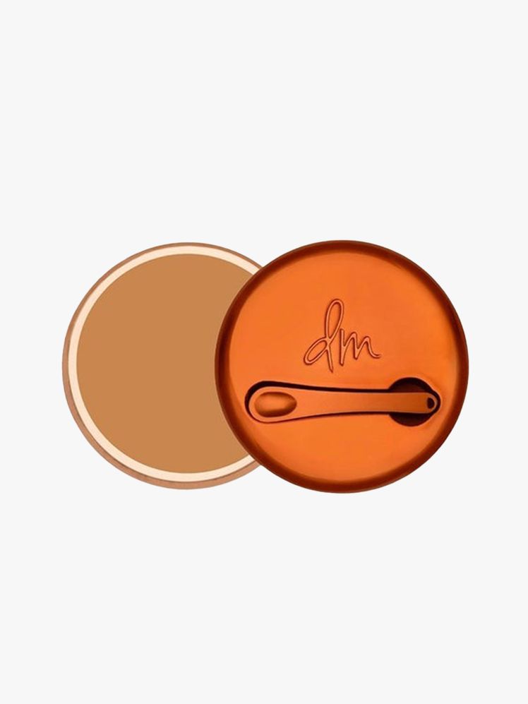 Danessa Myricks Beauty Yummy Skin Blurring Balm Powder jar of foundation balm on light gray background