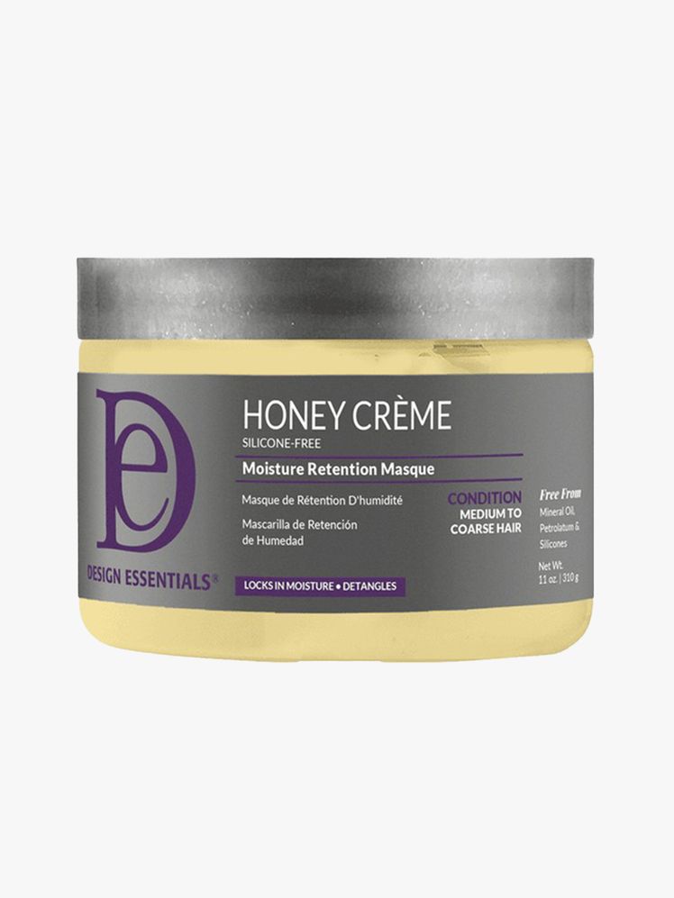 Design Essentials Honey Crème Moisture Retention Masque yellow jar with gray label and lid on light gray background