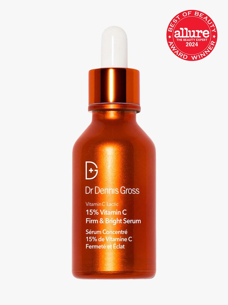 antioxidant serum in branded bright orange bottle with white and orange pipette on light gray background with red and...