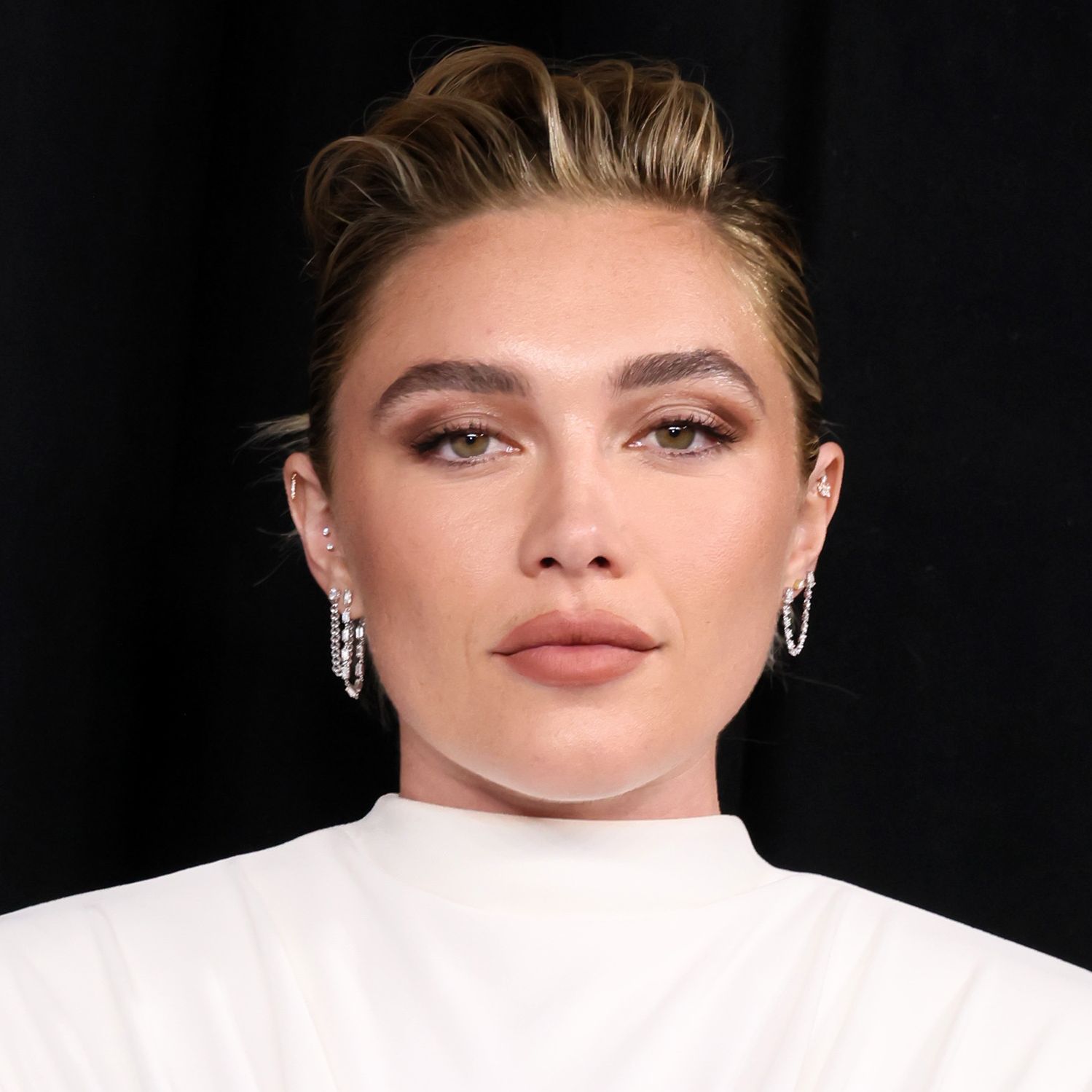 Only Florence Pugh Could Blend the '60s and '80s Into One Hairstyle
