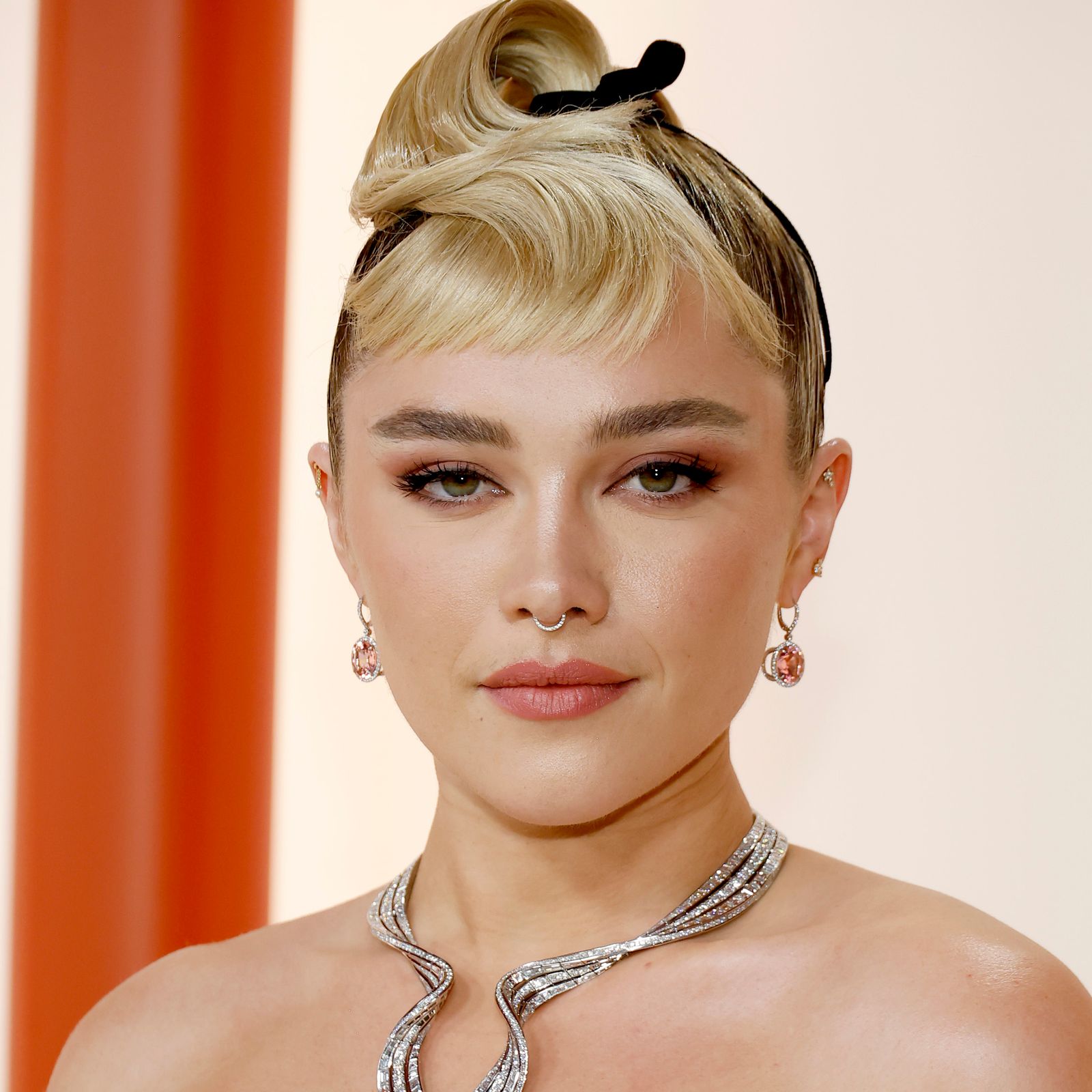 I Want Florence Pugh's Neon Orange Eye Shadow to Be Spring's Biggest Trend