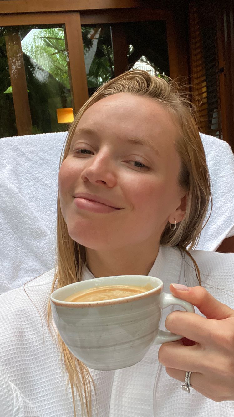 Image may contain Cup Beverage Coffee Coffee Cup Blonde Hair and Person