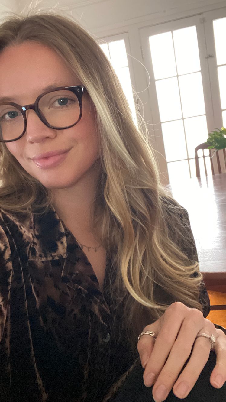 Image may contain Blonde Hair Person Plant Accessories Jewelry Ring Glasses Adult Face Head and Photography