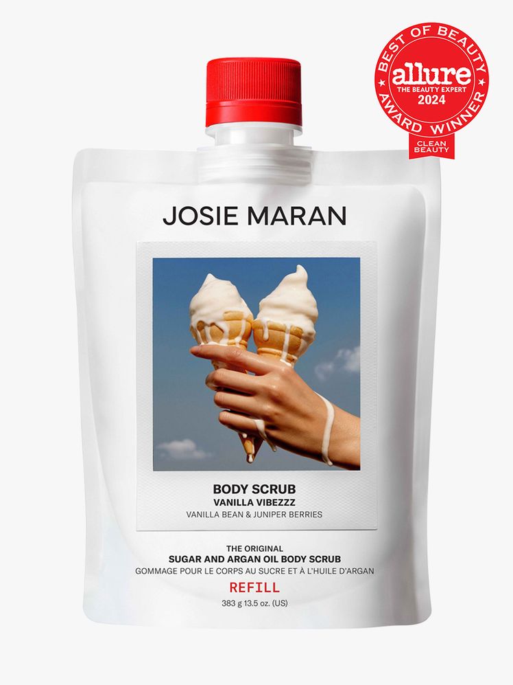 body scrub in branded white pouch with red cap on light gray background with red and white 2024 allure best of beauty seal