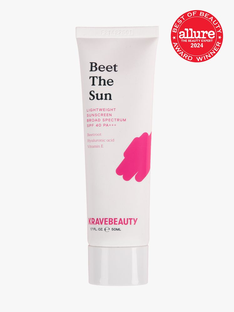 sunscreen in branded white tube with cap on light gray background with red and white 2024 allure best of beauty seal