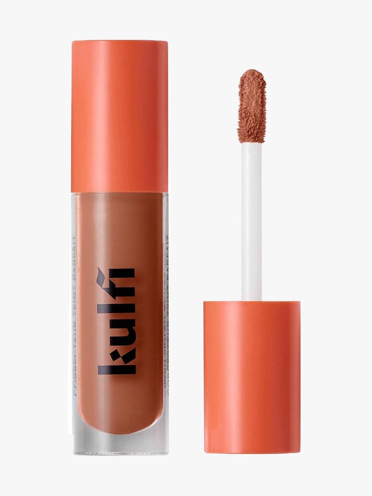Kulfi Main Match CreaseProof LongWear Hydrating Concealer vial of concealer with orange cap on light gray background
