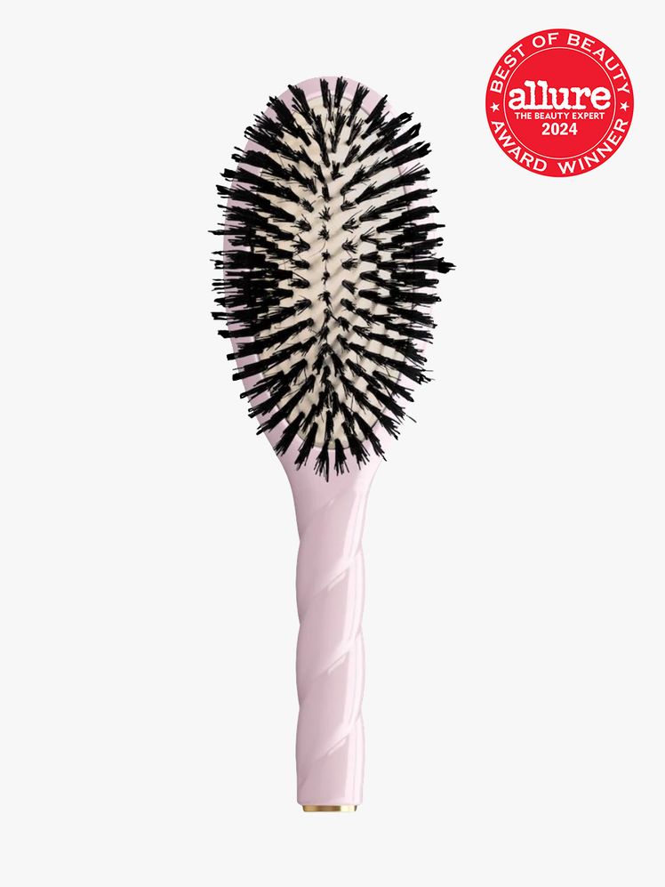 hair brush in pink and black color way on light gray background with red and white 2024 allure best of beauty seal