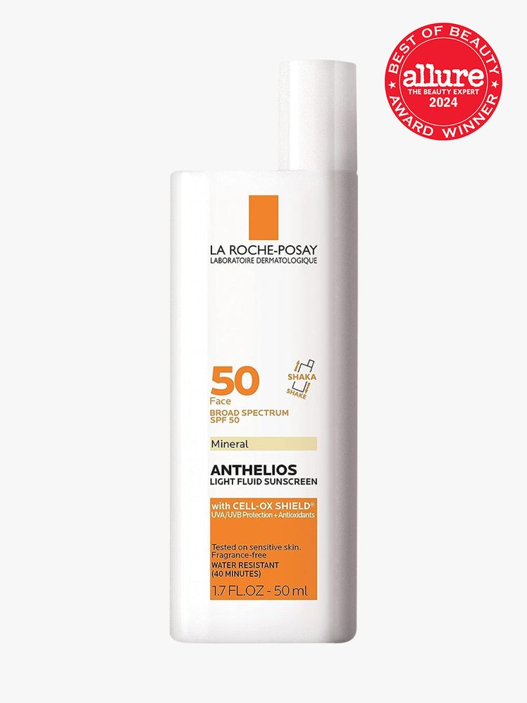 sunscreen in branded white bottle with cap on light gray background with red and white 2024 allure best of beauty seal