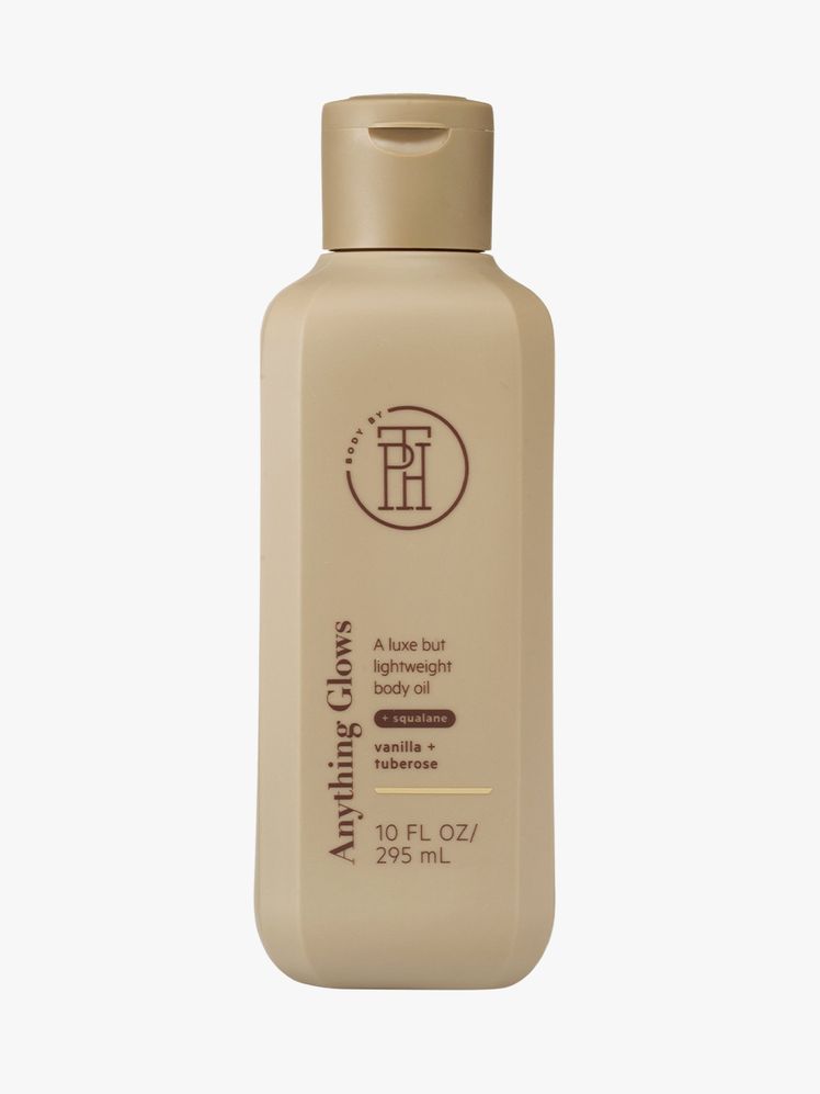 Body Oil brown bottle on light grey background