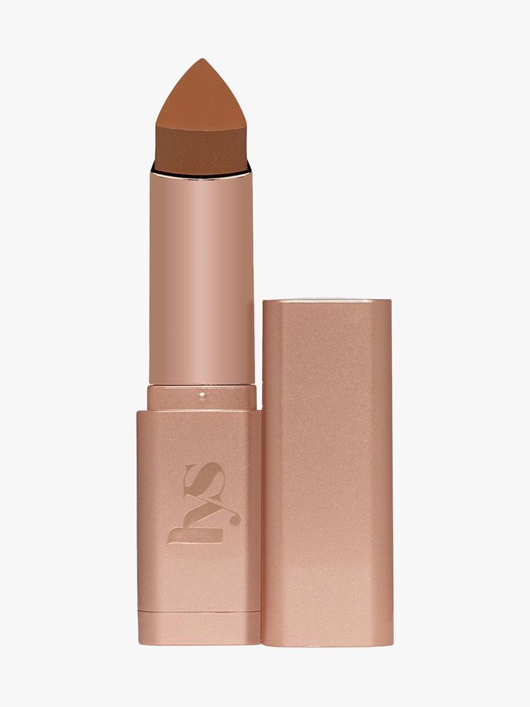 LYS Beauty No Limits Cream Bronzer Stick tan twist up bronzer stick with cap to the side on light gray background
