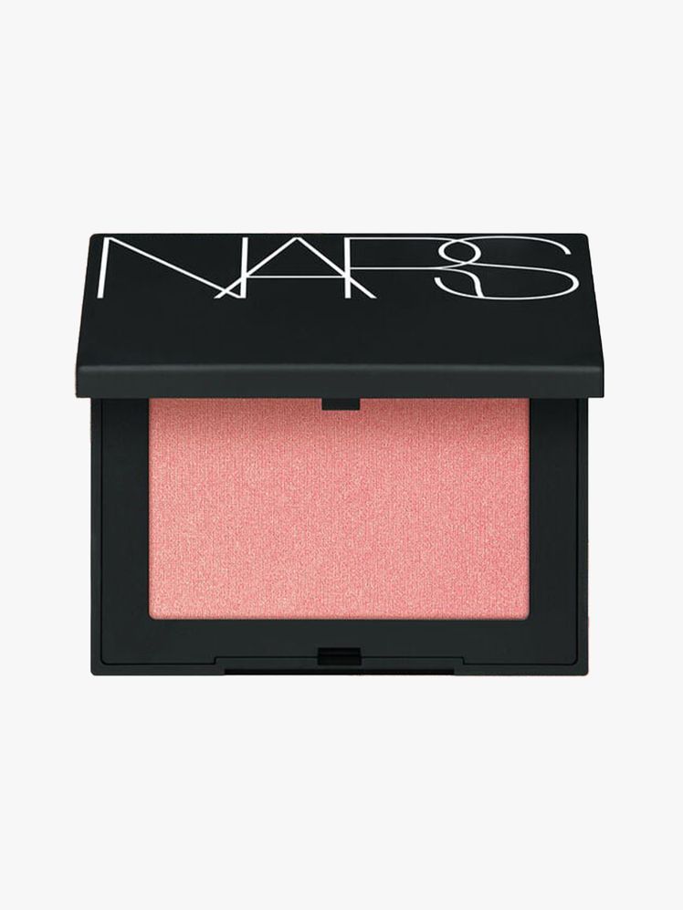 Nars Powder Blush in Orgasm black rectangle compact of peachy pink blush on light gray background