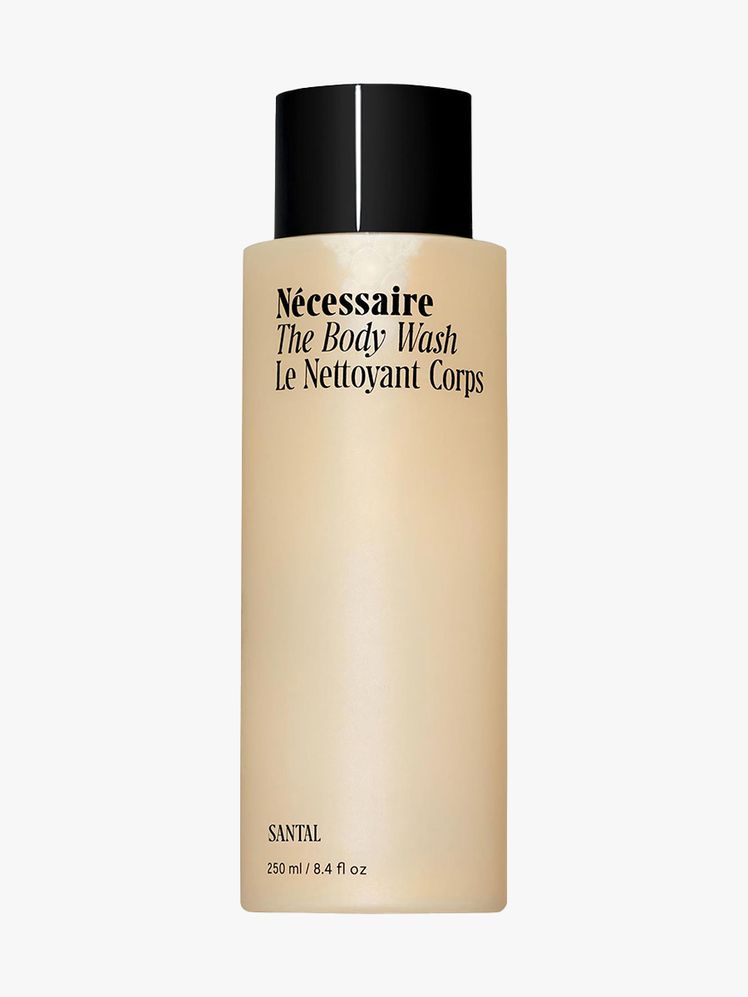 Ncessaire The Body Wash Santal bottle of beige body wash with black cap on light gray background