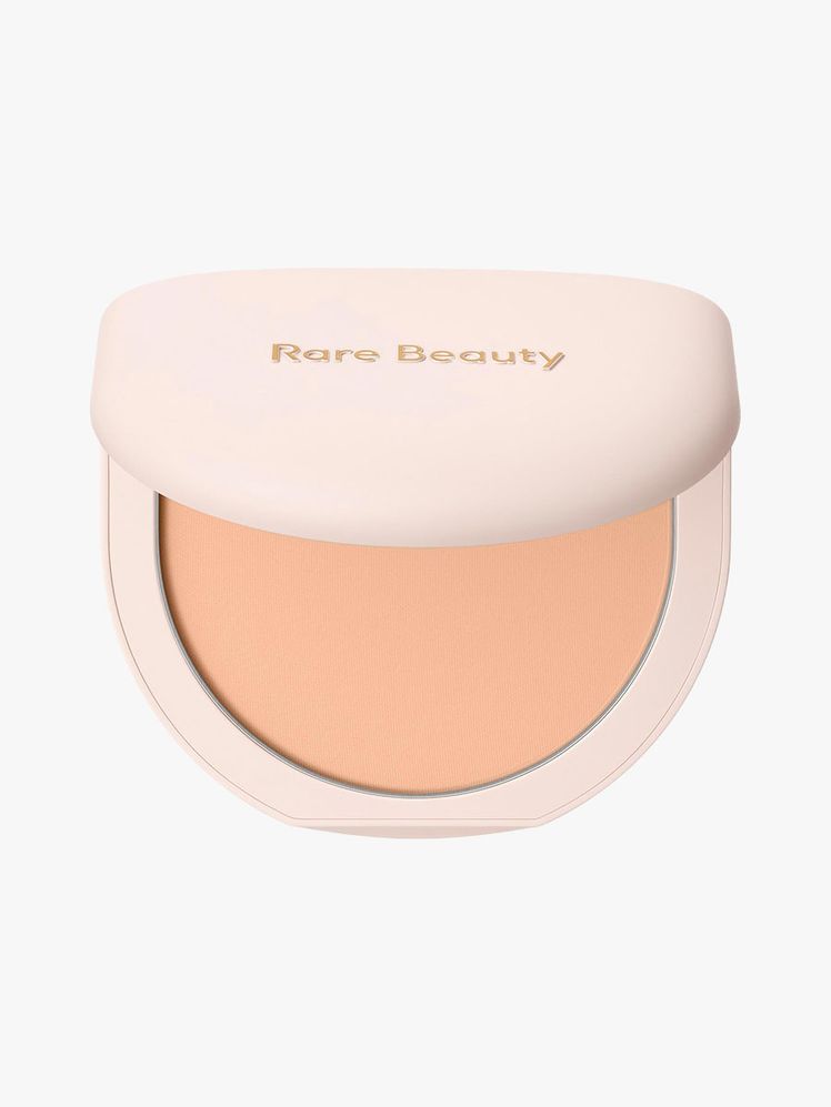 Rare Beauty True To Myself Tinted Pressed Finishing Powder pale pink compact of face powder on light gray background