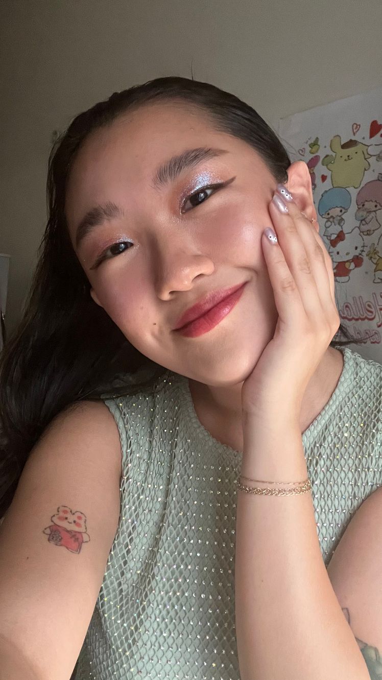 Image may contain Head Person Face Dimples and Adult