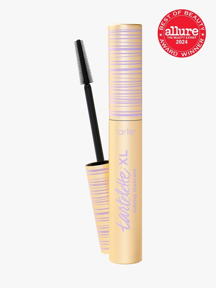 Tarte Tartelette XL Tubing Mascara twist up branded component in yellow with purple accents on a light gray background...