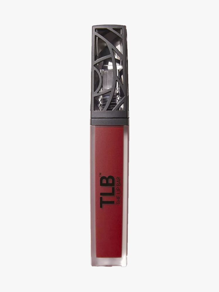 The Lip Bar Nonstop Liquid Matte in Bawse Lady vial of maroon liquid lipstick on light gray background