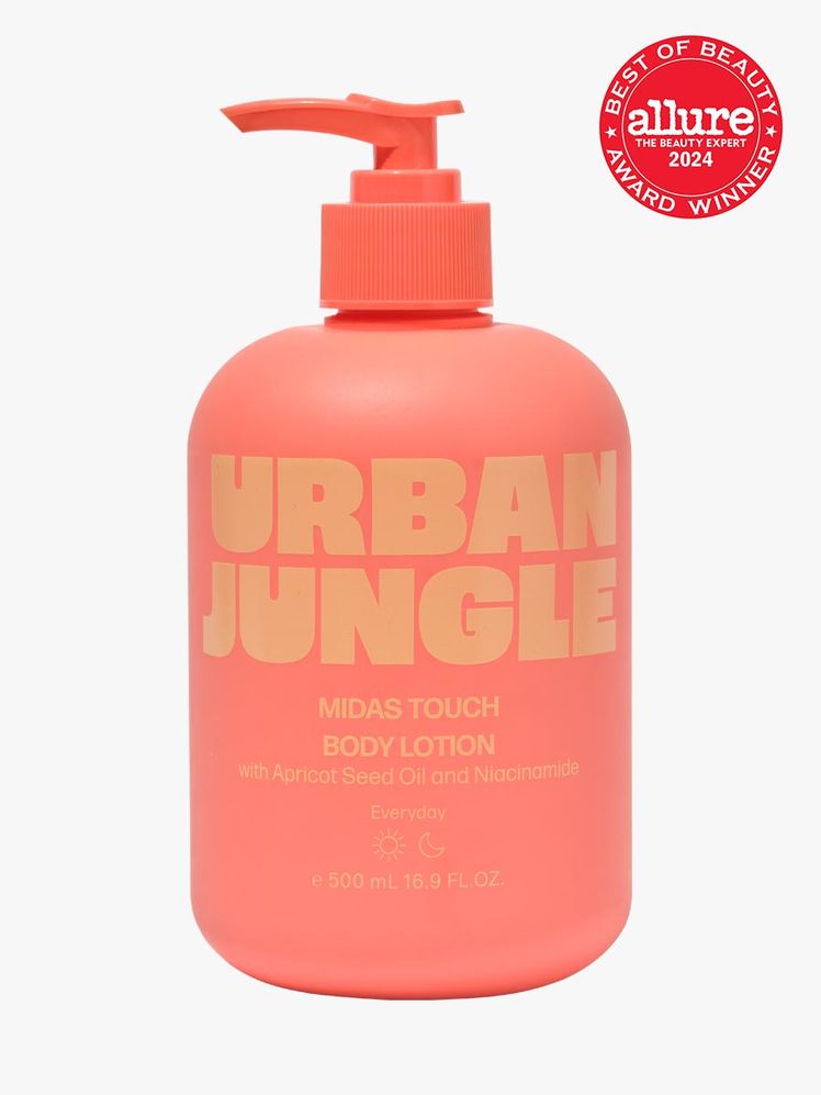 Urban Jungle Midas Touch Body Lotion branded bottle component with orange accents on a light gray background with red...