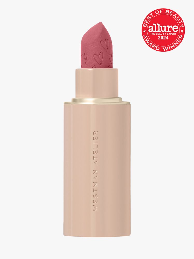 matte lipstick in branded soft pink bullet packaging on light gray background with red and white 2024 allure best of...