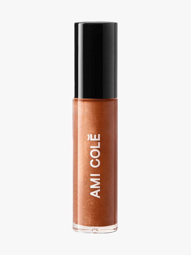 Ami Cole Lip Treatment Oil in branded twist up component on a light gray background