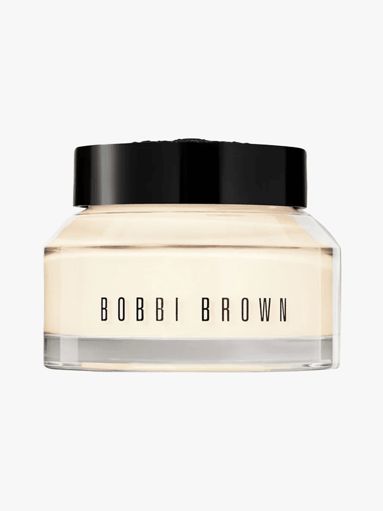Bobbi Brown Vitamin Enriched Face Base Moisturizer  Primer in a branded tub component with black accents on a light gray...