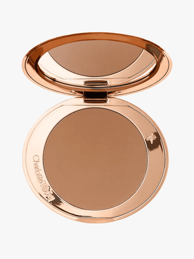 Charlotte Tilbury Airbrush Matte Bronzer in branded powder component on a light gray background