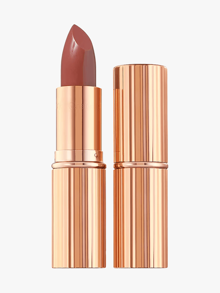 Charlotte Tilbury Pillow Talk Intense K.I.S.S.I.N.G. Lipstick in branded component on a light gray background