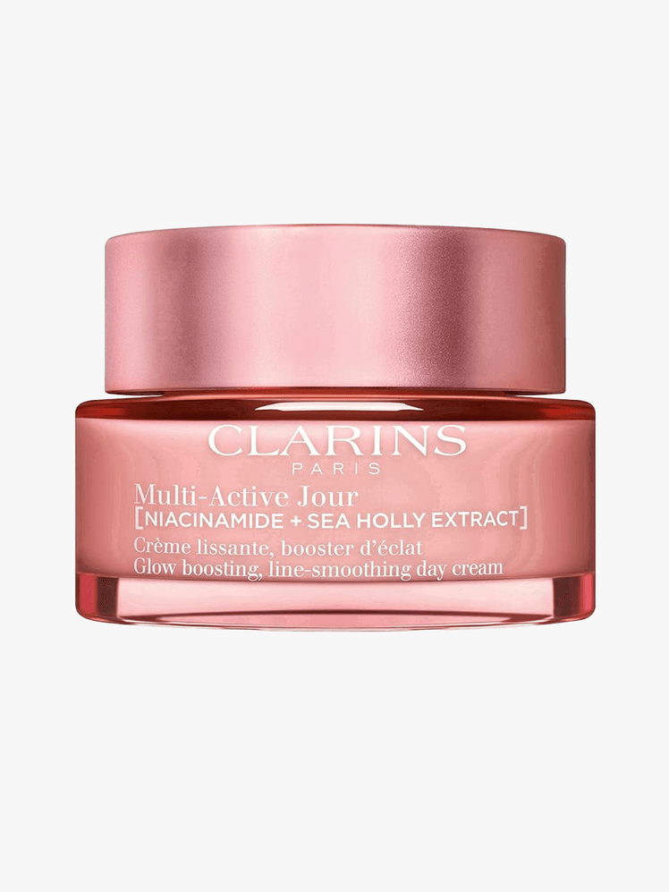 Clarins MultiActive Day Face Cream  All Skin Types in pink branded tub component with white accents on a light gray...