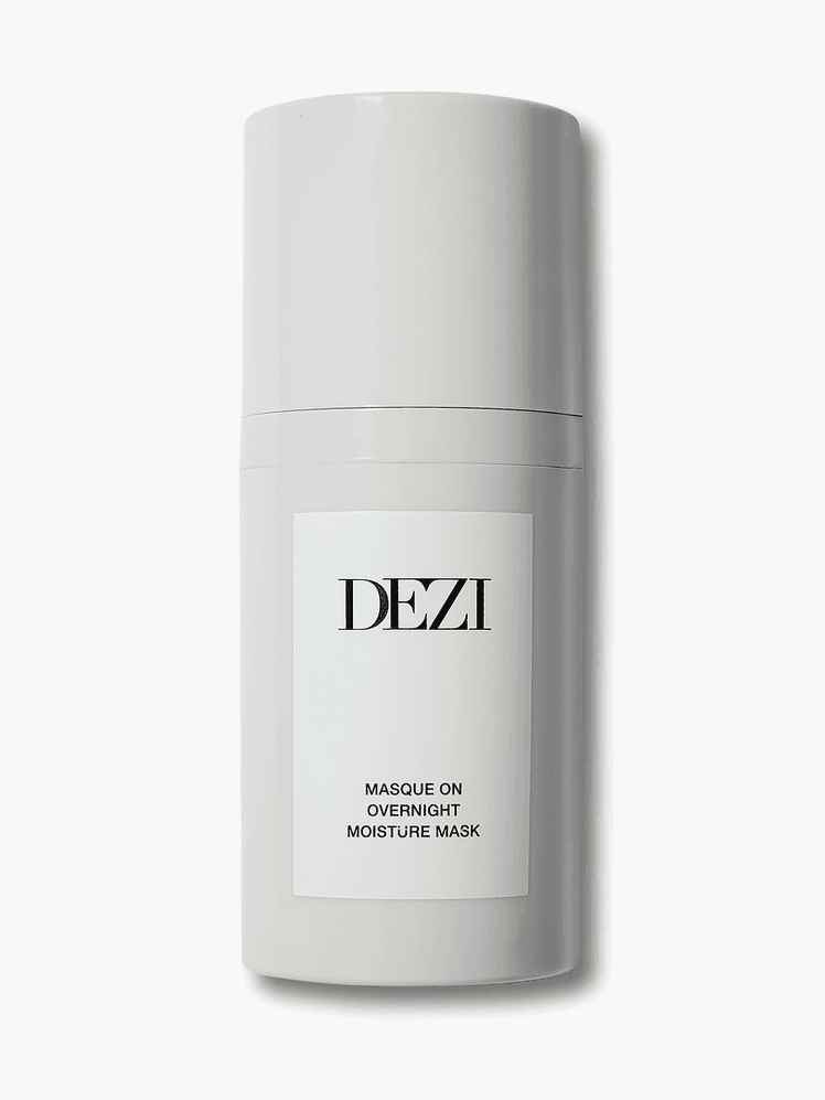 Dezi Skin Masque On Overnight Moisture Mask in branded gray bottle on light gray background