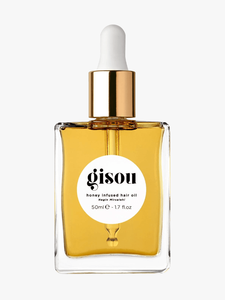 Gisou Honey Infused Hair Oil in branded component on a light gray background