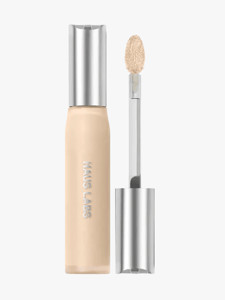 Haus Labs by Lady Gaga Triclone Skin Tech Concealer in branded twist up component with silver components on a light gray...