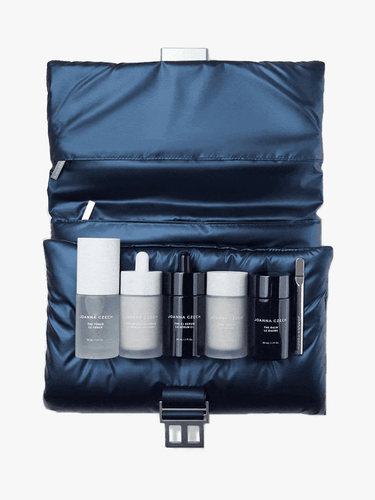 Joanna Czech Skincare The Kit with multiple branded components on a light gray background
