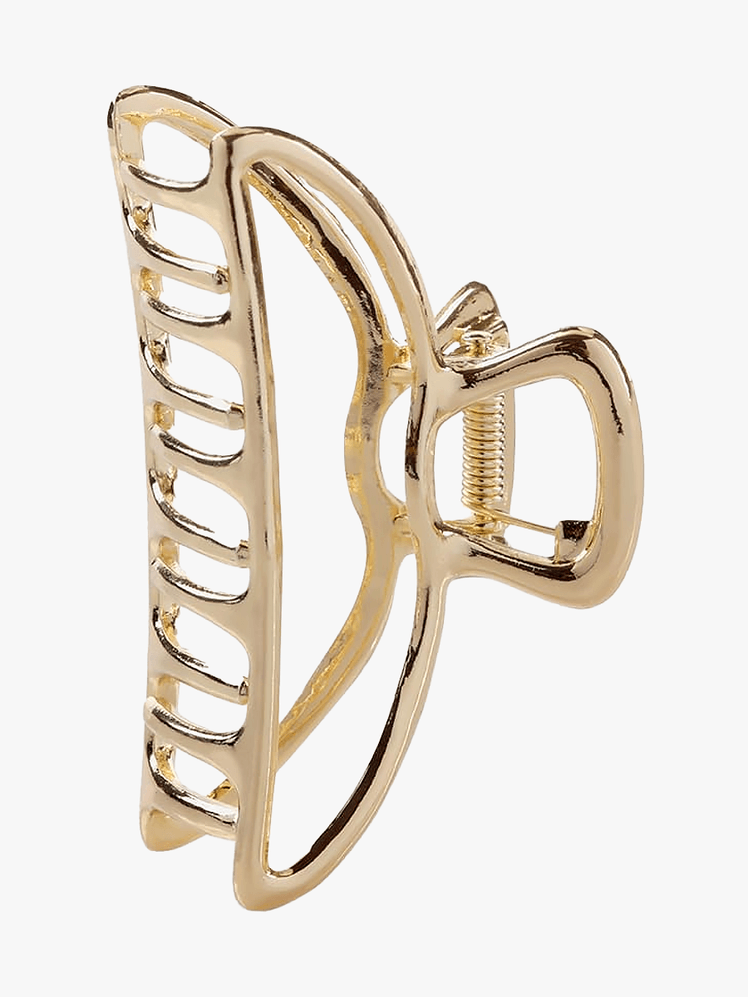 Kitsch Open Shape Claw Clip in Gold on a light gray background