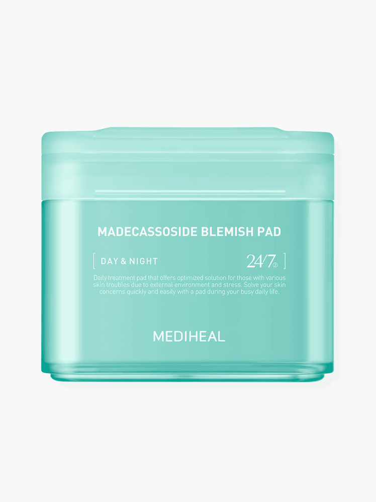Madecassoside Blemish Pads in branded teal canister on light gray background