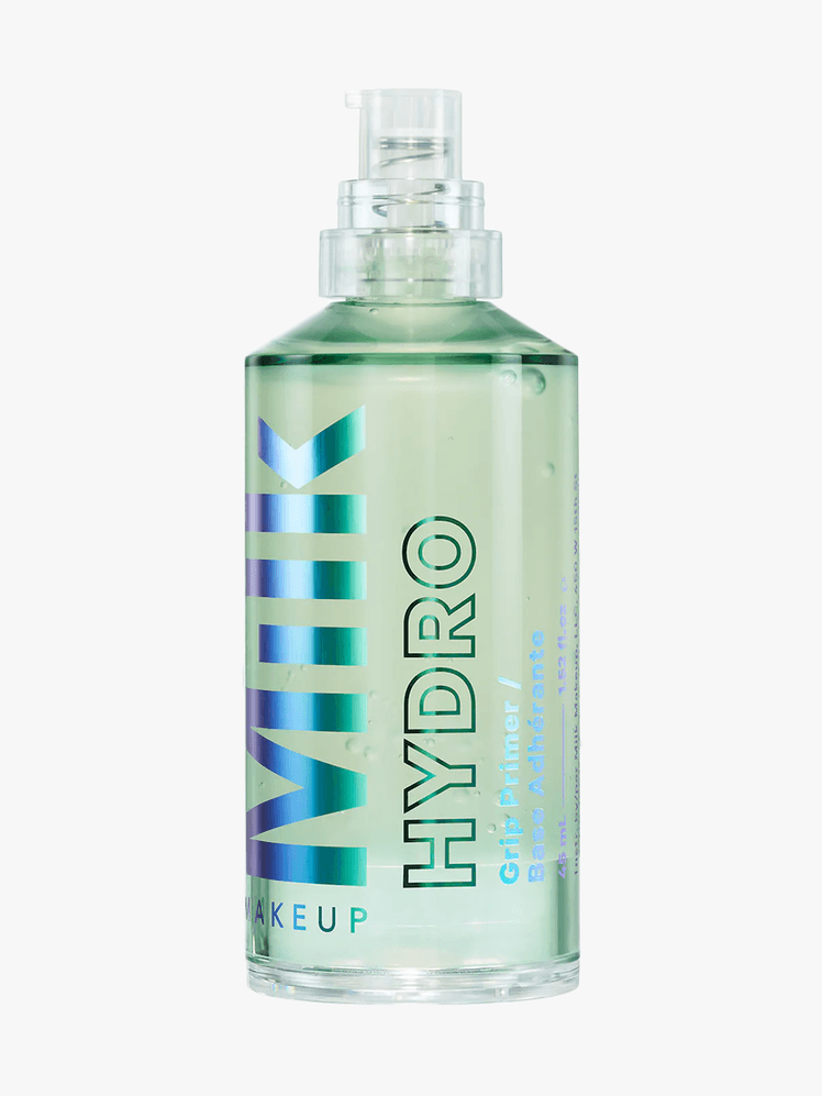 Milk Makeup Hydro Grip Makeup Primer in clear branded bottle with pump on light gray background