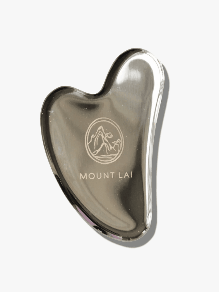 Mount Lai Stainless Steel Gua Sha Facial Lifting Tool in branded component on a light gray background