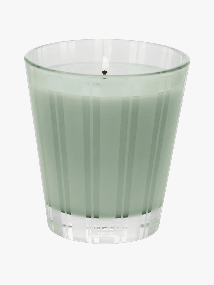 Nest Wild Mint and Eucalyptus Candle on a light a gray background