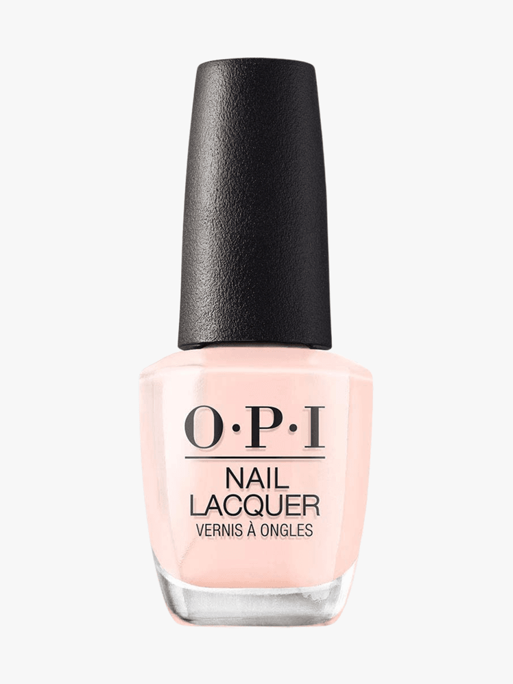 OPI Nail Lacquer bottle with light pink nail polish inside and black cap and black lettering on grey background