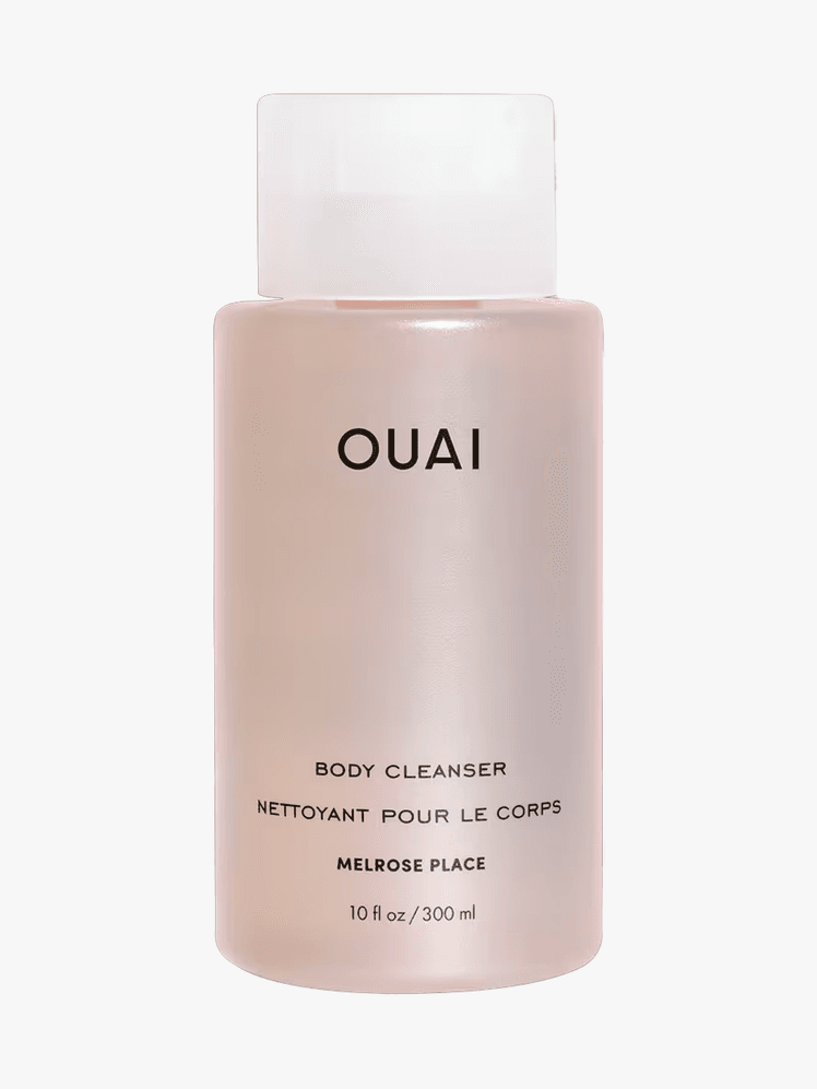OUAI Melrose Place Body Wash in branded bottle component with black accents and white cap on a light gray background