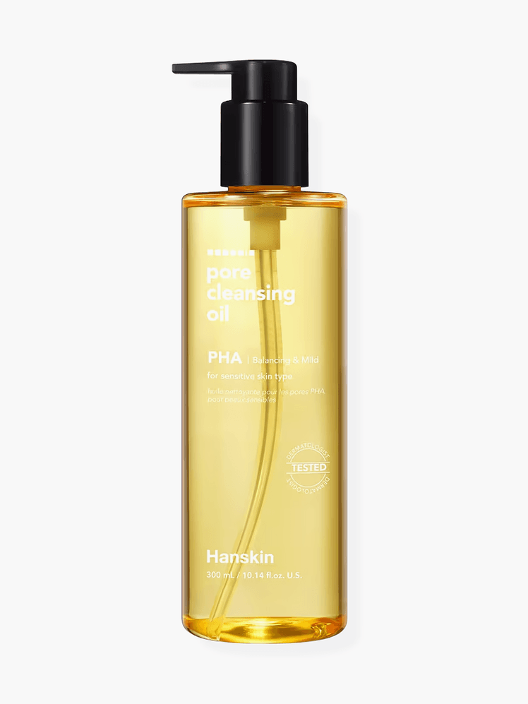 Pore Cleansing Oil in branded clear bottle with black pump on light gray background