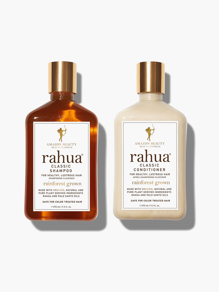 Rahua Classic Essential Hair Care Set in branded clear bottles with gold caps on light gray background