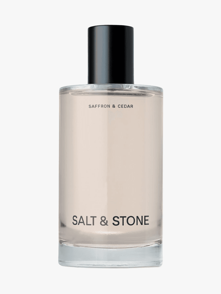 Salt  Stone Saffron  Cedar Body Mist in branded component on a light gray background