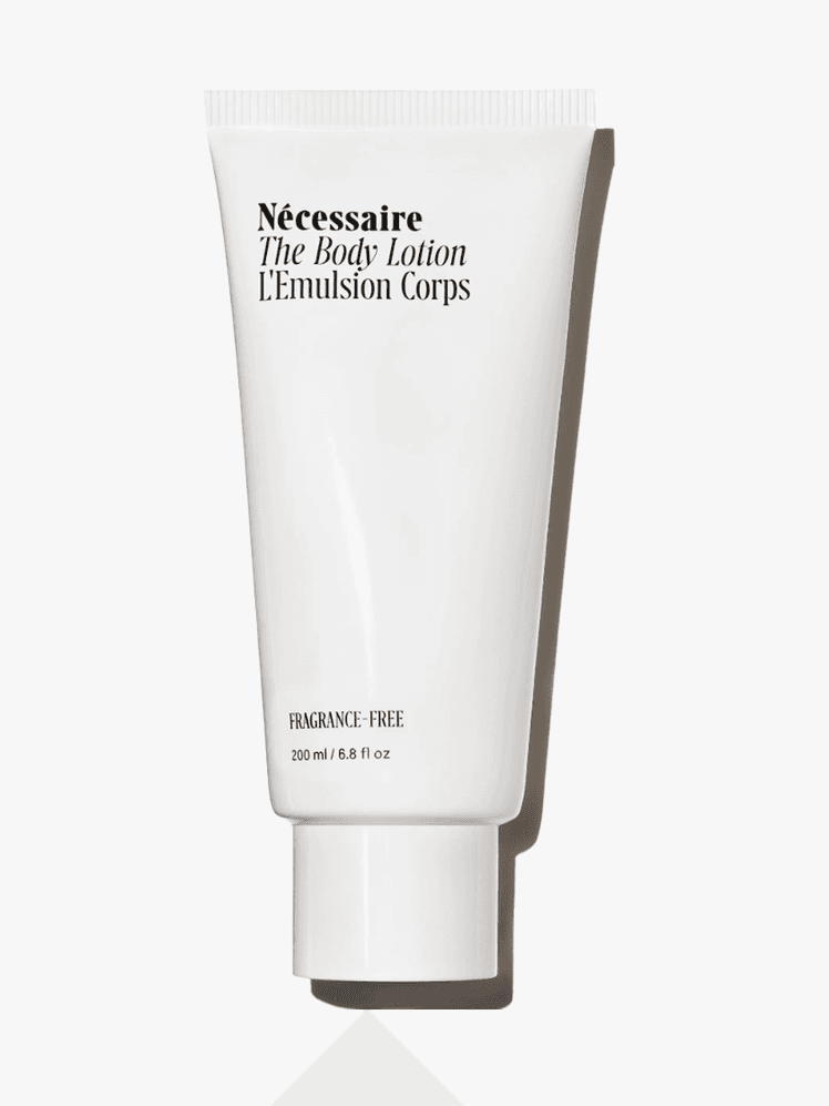 The Body Lotion in branded white tube with cap on light gray background